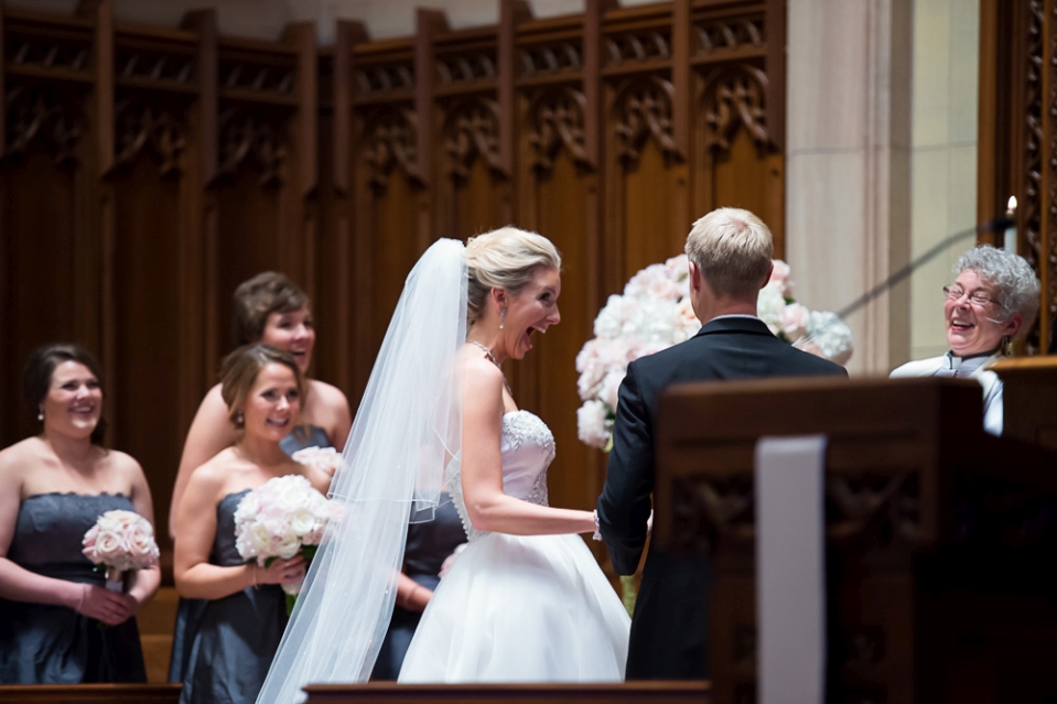Bride reacts with great smile after being wed.